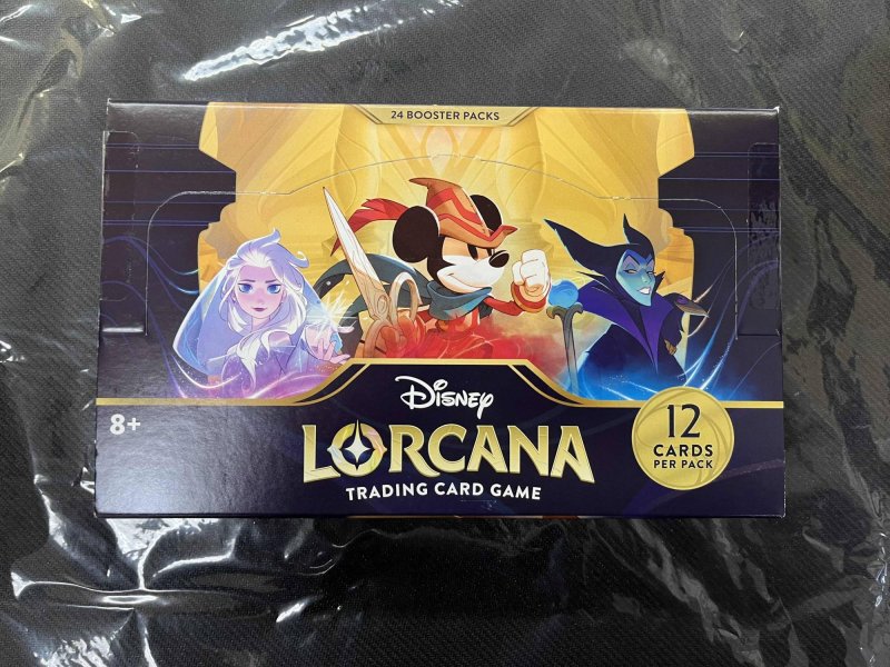 画像1: Disney Lorcana「The First Chapter」(1BOX・24パック入)[Disney Lorcana(ロルカナ)新古品] (1)